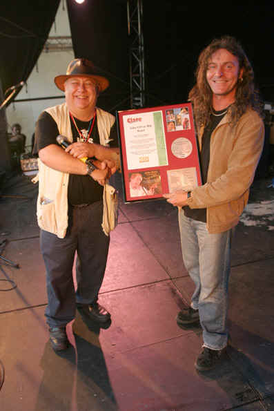 Richard receiving a 'Cardboard Disc' award from Paul Cooper